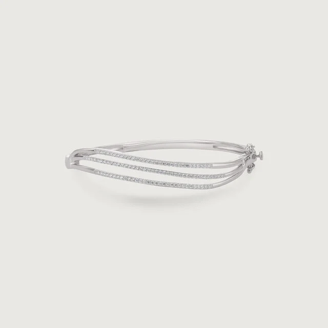 graceful layered silver bangle-Avara Jewels Graceful layered silver bangle by Avara Jewels, showcasing elegant craftsmanship by the best jewellery brand in India